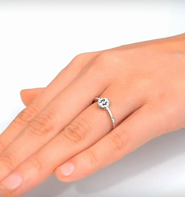 Halo Ring with 0.11ct of Diamonds set in 9K White Gold
